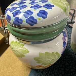 Beautiful three price canister set with a floral (hydrangea ) pattern.